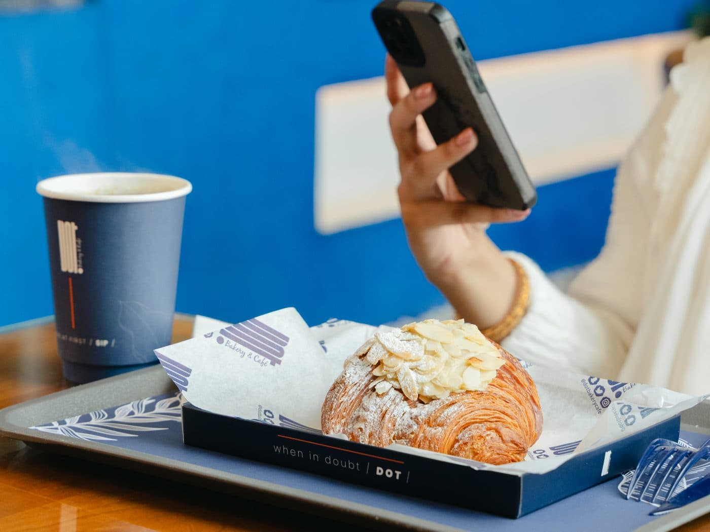 A croissant on a DOT tray