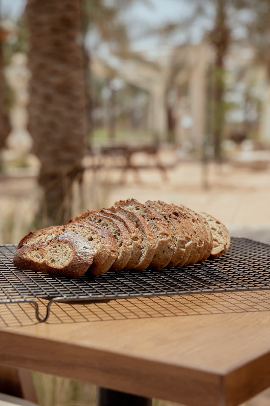 Sliced sourdough on a cooling rack